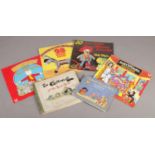A small collection of children's books and records. Includes Florence K Upton book, Enid Blyton,