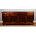 A large stained pine sideboard. Height 90cm, Width 208cm, Depth 47cm.
