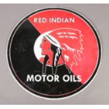 A reproduction Red Indian Motor Oils enamel advertising sign. 61cm diameter.