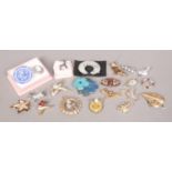 A collection of vintage costume jewellery brooches, to include cameo, animal and Spode ceramic