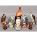 Eight Beswick Beneagles whiskey decanters. All empty. Small chips to base of head (largest bird).