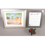 A framed Pro Hart print along with a metal sculpture of a pig marked Pro Hart to the base.