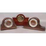 Three wooden cased 8 day mantel clocks. To include Foreign etc.