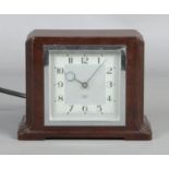 An art deco Smith Sectric Bakelite electric mantle clock. 13.5cm high. Plug has been cut off.