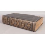 A large leather bound 'Self Interpreting' Family Bible, published by Thomas Kelly, London.