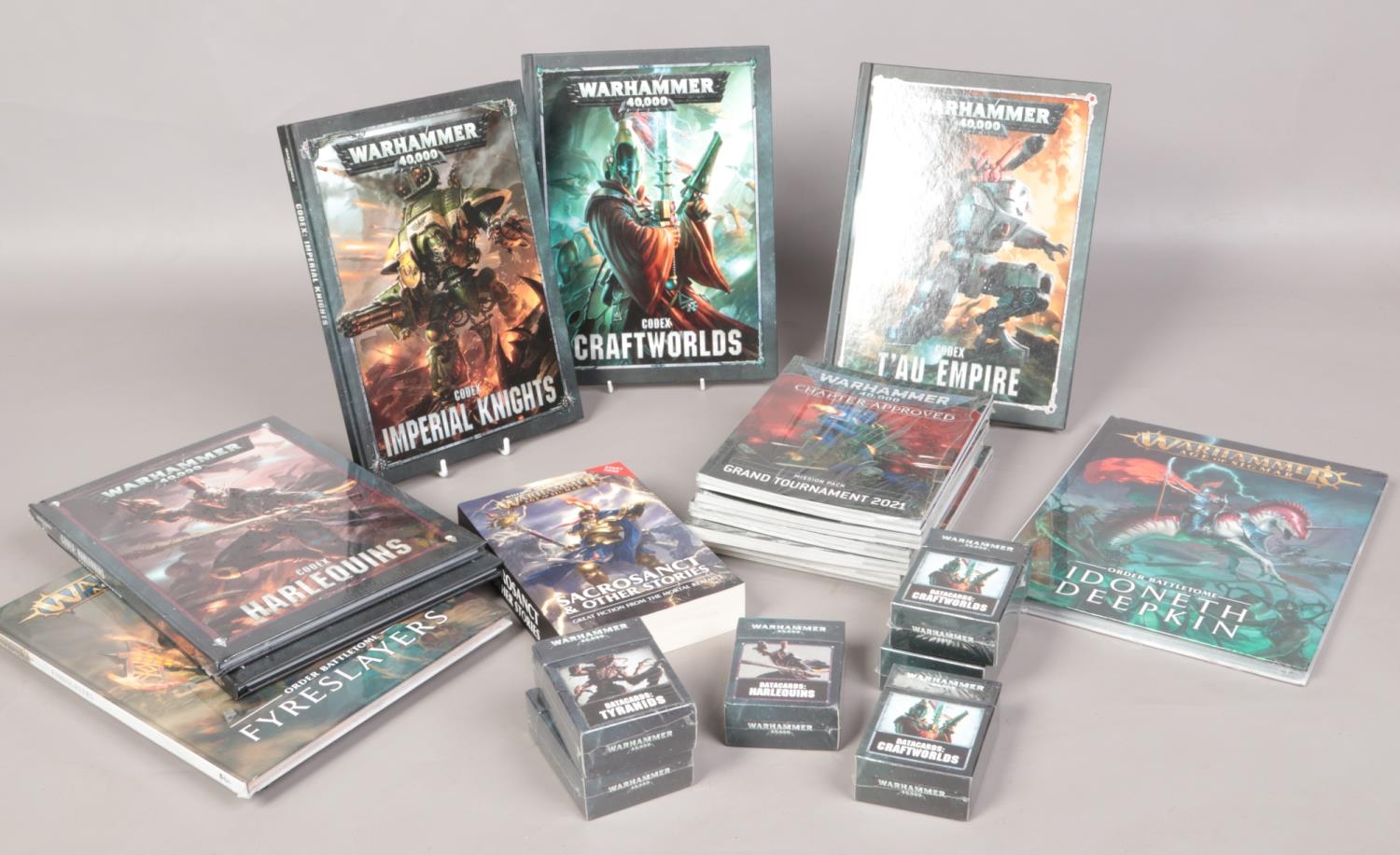 A quantity of Warhammer books & data cards. To include datacards Craftworlds, Tyranids,