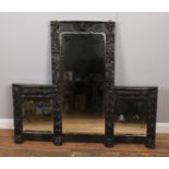 A Victorian decoratively carved over mantle mirror. H:97cm W: 115cm.