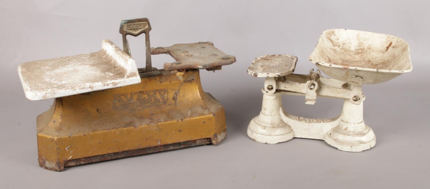 Two sets of vintage weighing scales, including Avery example.