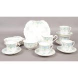 A Radfords Fenton 'Poppy' part tea set. cups/saucers, sugar bowl, milk jug etc