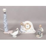 A Lladro 'Swan clock' 5777, together with NAO figures and NAO table light (missing figure). Damage