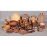 A very large quantity of ornamental treen. To include candlesticks, fruit, pestle and mortar and