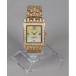 A ladies Bellagio gold plated quartz wristwatch, with mother of pearl dial and Roman Numeral quarter
