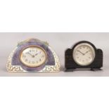 Two small alarm clocks; H.A.D ebony and enameled front examples. Widest: 15cm.