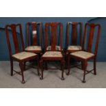 A set of six mahogany Queen Anne Style dining chairs with upholstered seats. H:106.5cm W: 44.5cm