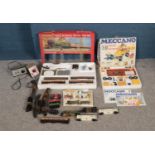 A Hornby Flying Scotsman Electric Train Set with a Meccano Construction Set. Both come with