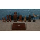 A box of assorted carved objects. To include tribal examples etc.