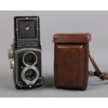 A Rollei Rolleicord Franke and Heidecke TLR camera, serial number: 1365862, in brown leather case.