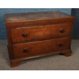 A Victorian oak chest of two drawers. (70cm x 102cm)