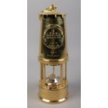 An Eccles Type 6 brass miners lamp The Protector Lamp & Lighting Co. Marked for RAF Finningley.