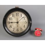 A Seth Thomas Wall clock with an Elgin cased alarm clock. Wall Clock will need attention as not