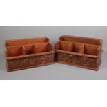 A matching pair of carved hardwood desk organisers. H: 20cm W:36cm