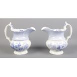 A pair of 19th Century Brameld blue and white ewers; purportedly shown at the Rockingham