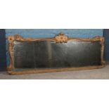 An early 20th century overmantel mirror. (62.5cm height 170cm width)