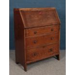 A 1930s/1940s small oak bureau.