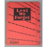 'Lest We Forget'; a hardback book published by The Daily Mail, describing 'The Horrors of The Nazi