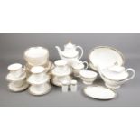 A Royal Doulton Forsyth H5197 part dinner and tea set. To include Coffee & Tea pot, milk, sugar