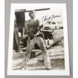 Chuck Norris, autographed monochrome photograph. (25.5cm x 20.5cm) No provenance