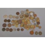 A selection of foreign coins. To include Chinese, Italian and Angola etc.