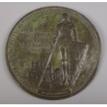 A circular bronze plaque presented to A R Curruthers. Presented in 1936 from the 3rd annual