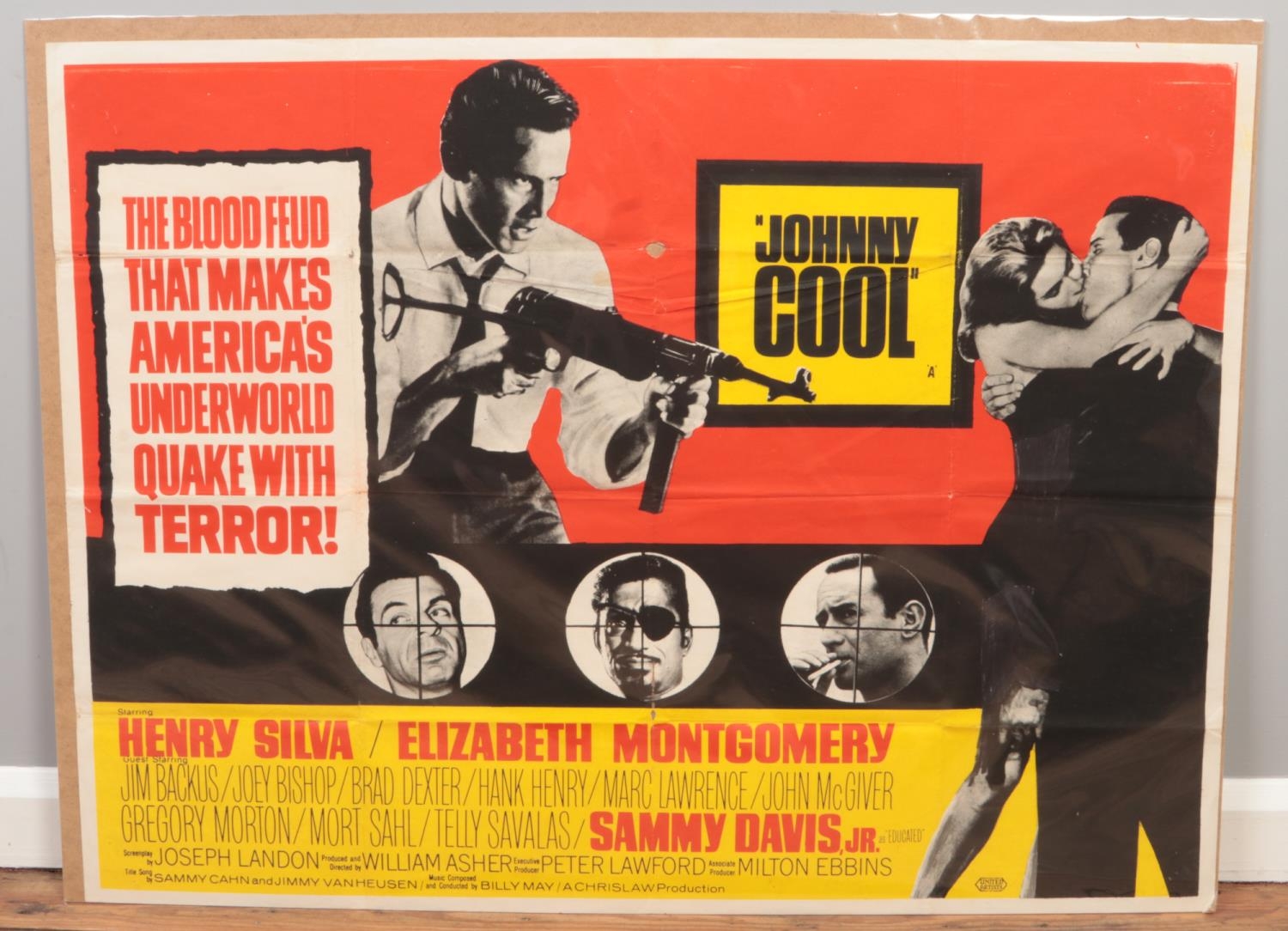 An original quad film poster for the film Johnny Cool. Some tears down folds.