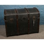 A vintage dome top trunk.