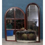 Three mirrors; including two arched and one art deco style examples. Tallest 101cm.