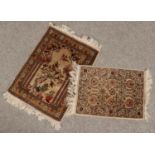 Two small silk rugs/prayer mats. Largest example 67cm x 49cm.