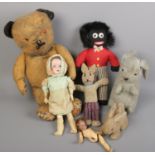 A quantity of soft toys and dolls. Including large jointed teddy bear, bisque head doll, etc.