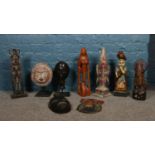 A box of assorted carved tribal figures. Tallest: 46cm.