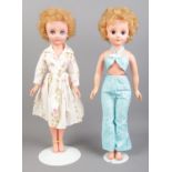 Two vintage Pedigree dolls on stands. Tallest: 51cm.