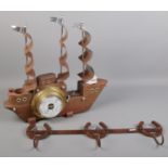 A novelty lamp/barometer formed as a ship along with a metal horse shoe coat hook.