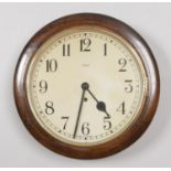 A mahogany cased Enfield wall clock. With pendulum.