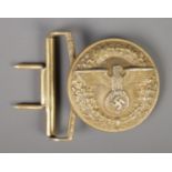 A German Third Reich Officer's gilt belt buckle, with central eagle surrounded with oak leaf