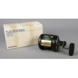 A Shimano TLD 30 2 Speed fishing reel, complete with instruction leaflet and box.