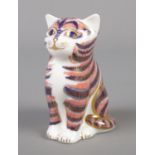 A Royal Crown Derby Imari pattern cat paperweight. Marks to base, gold stopper. 8cm height.