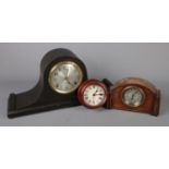 Three clocks. To include a Seth Thomas Napoleon hat mantle clock, a French Tapageur clock and