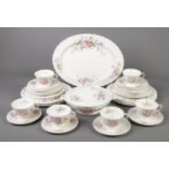 A collection of Royal Doulton bone china dinnerwares in the Arcadia pattern. Approximately 36