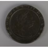 A 1797 George III wheel penny.
