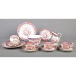 A Victorian ceramic part tea set. To include cups/saucers, milk jug, sugar bowl, plates etc Minor