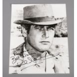 Paul Newman, autographed monochrome photograph, (25.5cm x 20.5cm)